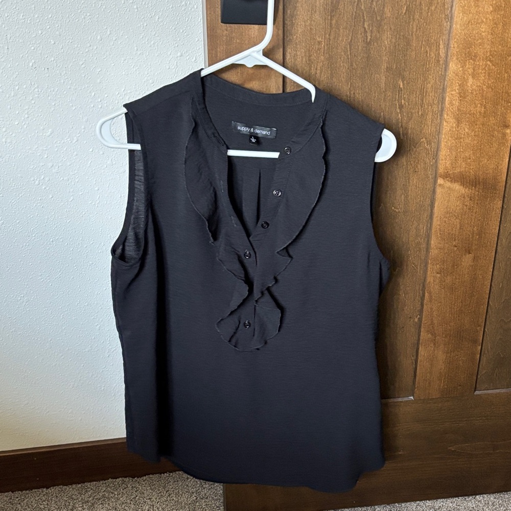 Elegant Black Sleeveless Blouse with Ruffles